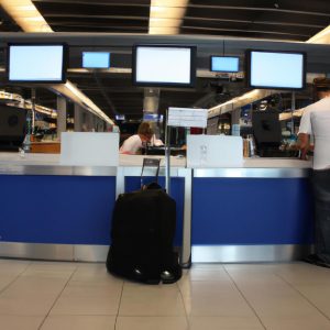 Person at airport check-in counter