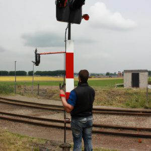 Person operating railway signaling equipment